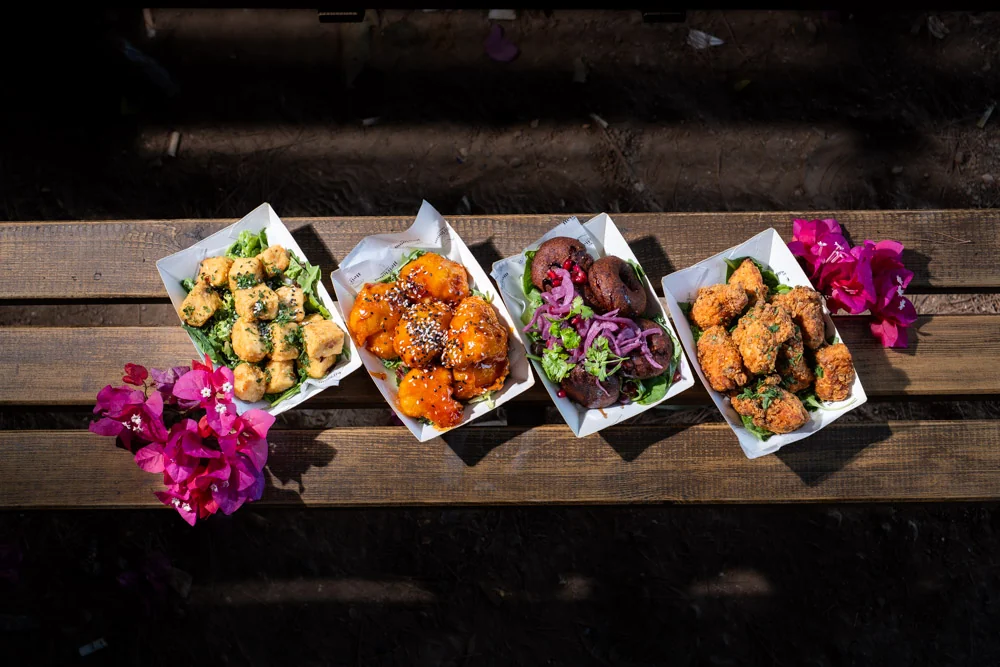 Individual Streatery portions served in paper trays