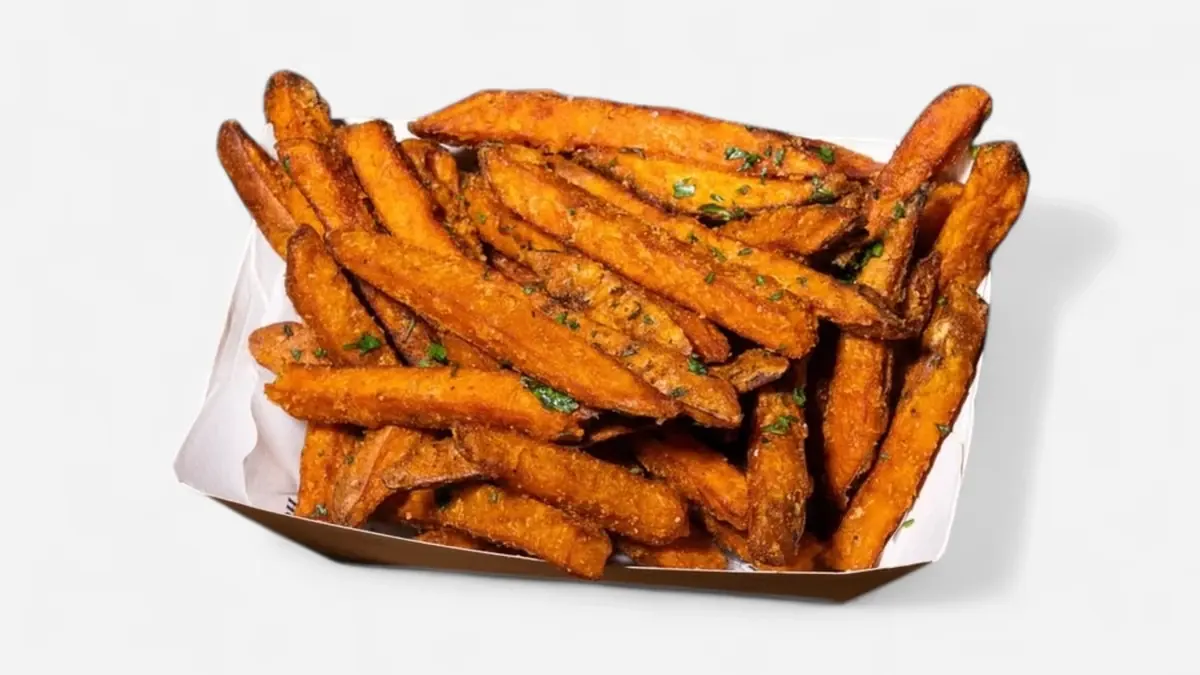 Sweet potato fries in a paper tray